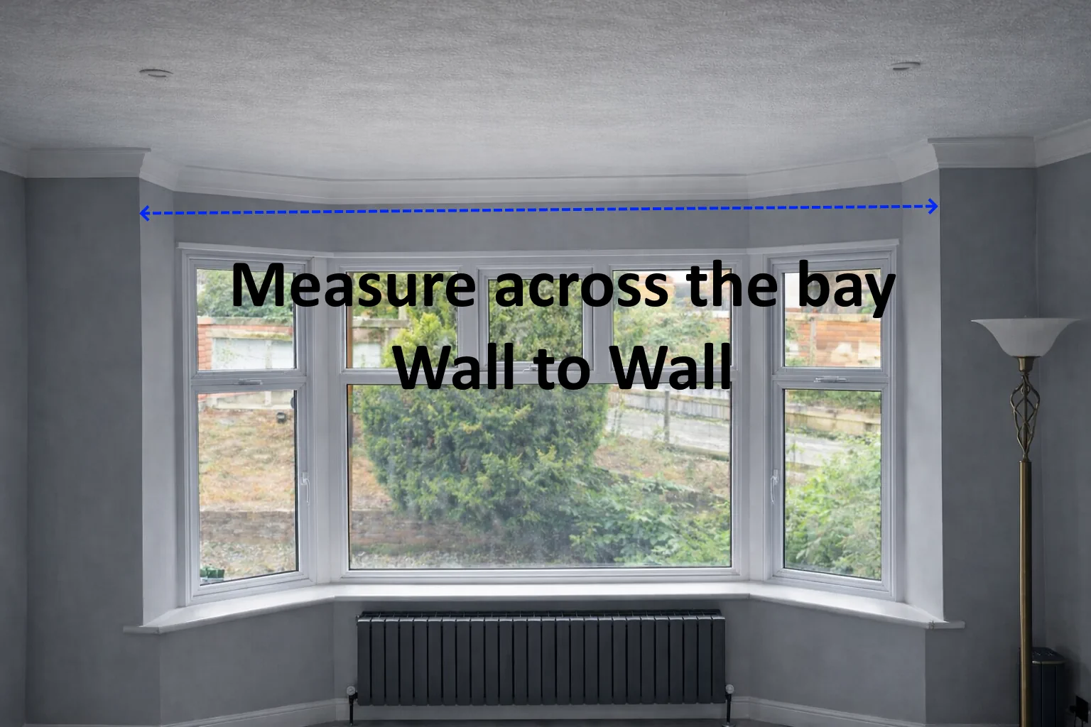 Measure across the bay from wall to wall