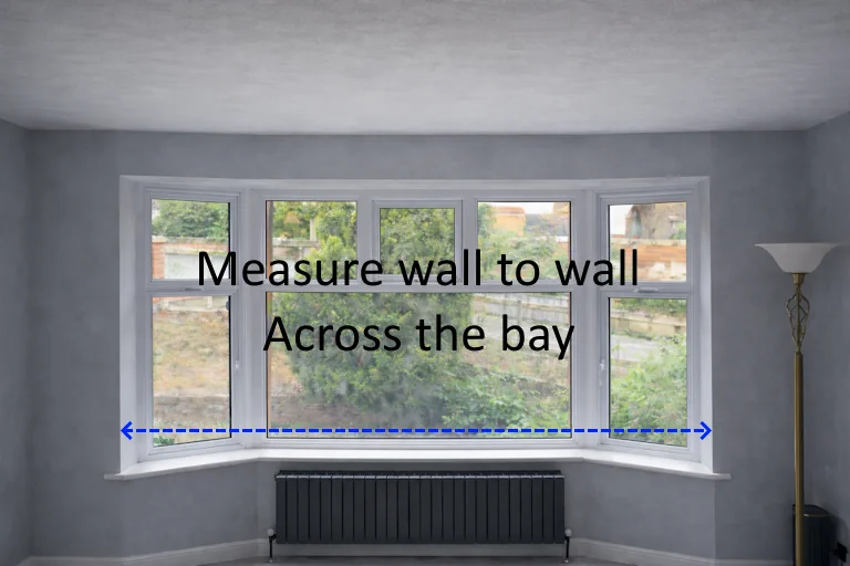 Measure wall to wall across the bay