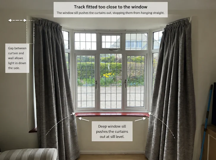 Bay window curtains not hanging properly