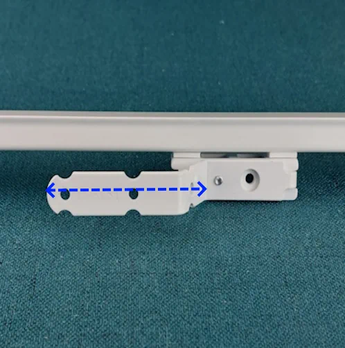 Curtain track overlap arm showing the overlap measurement