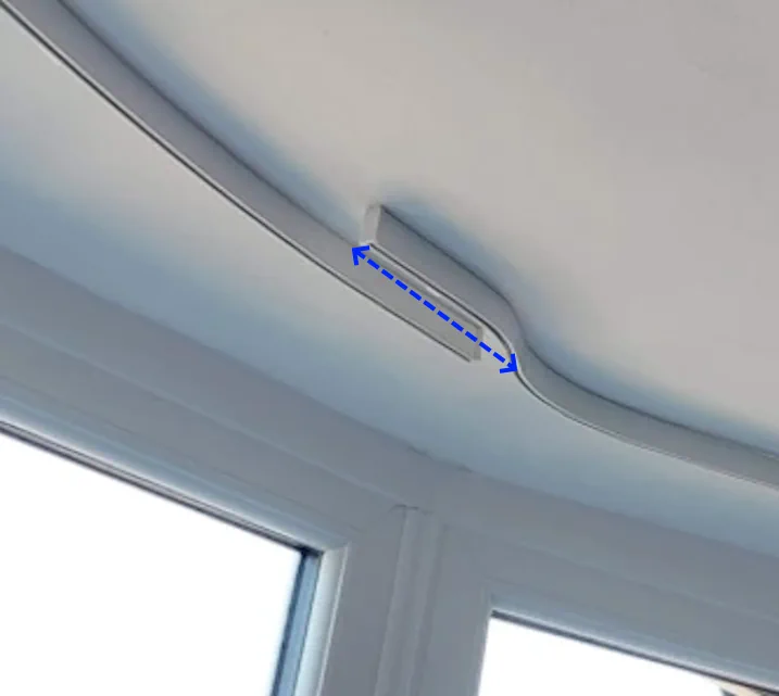 Curtain track centre overlap showing the overlap measurement
